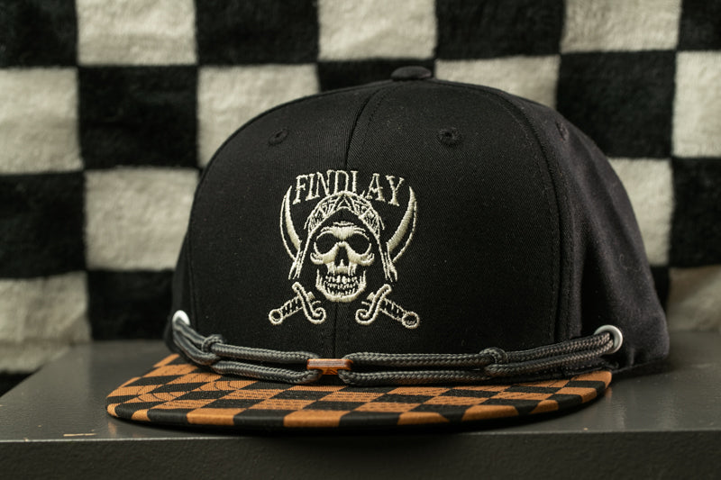 A black baseball cap with a skull and crossbones design, featuring the text "FINDlay" on the front.