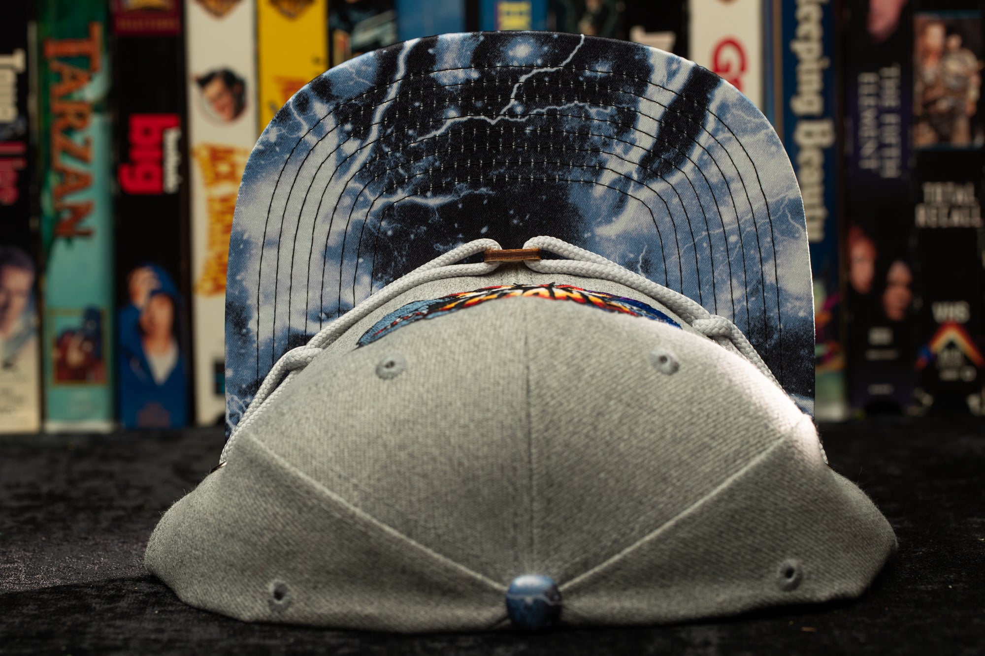 a hat and a skateboard sitting on a table