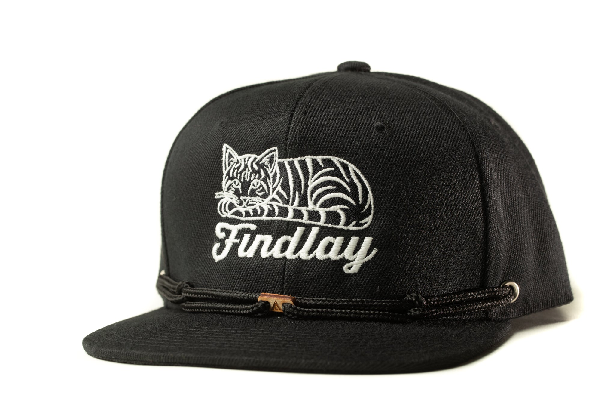 A black baseball cap with a white cat embroidered on it.