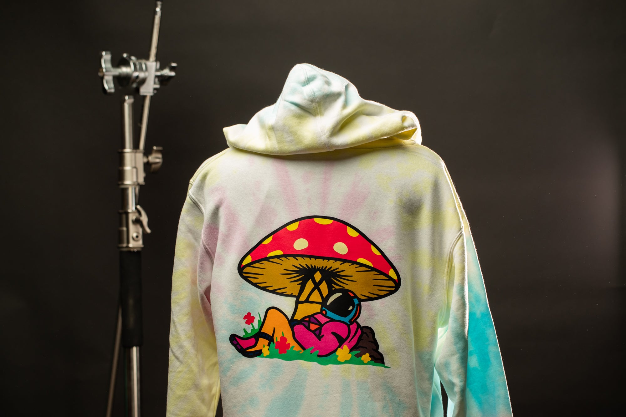 a hoodie with a picture of a mushroom on it