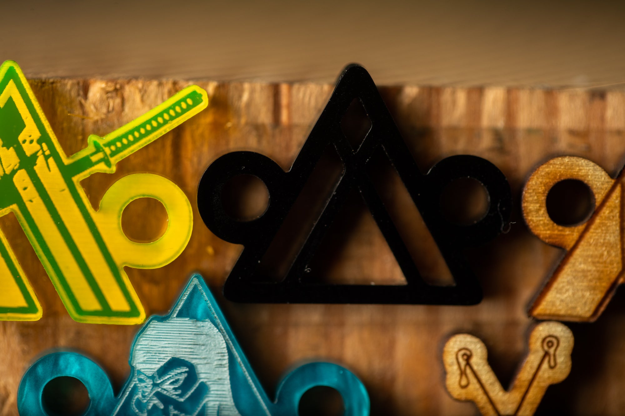 a group of wooden objects sitting on top of a wooden wall