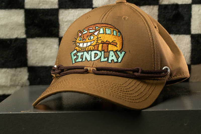 A brown baseball cap with a cat embroidered on it, featuring the text "FIND LAY" on the front.