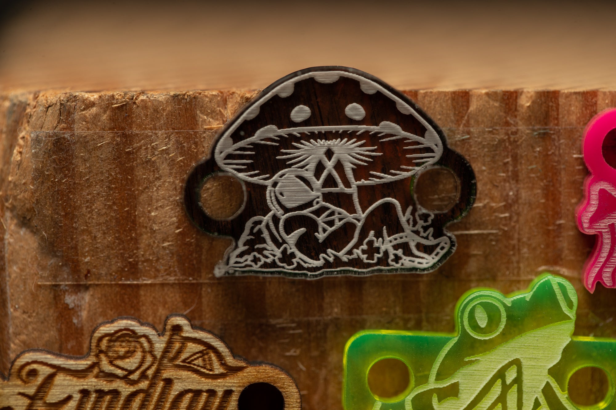 a close up of a piece of wood with various designs on it