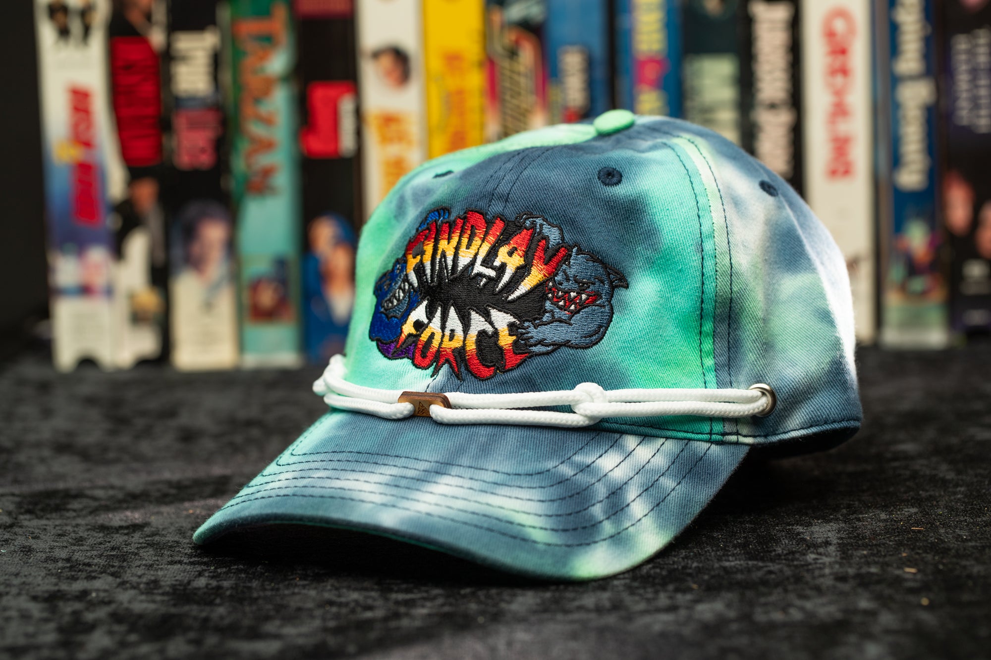 a tie - dye hat with a cartoon character on it