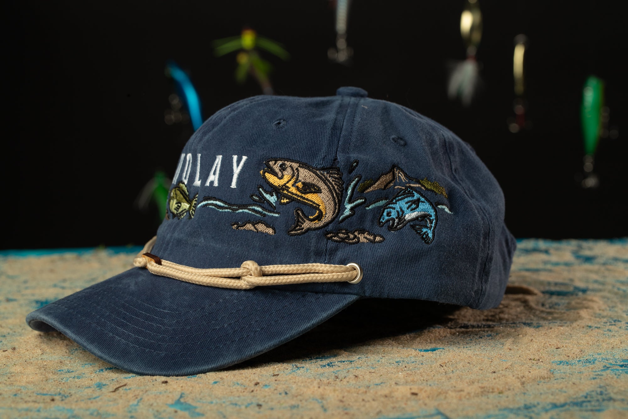 a blue hat with a fish on it