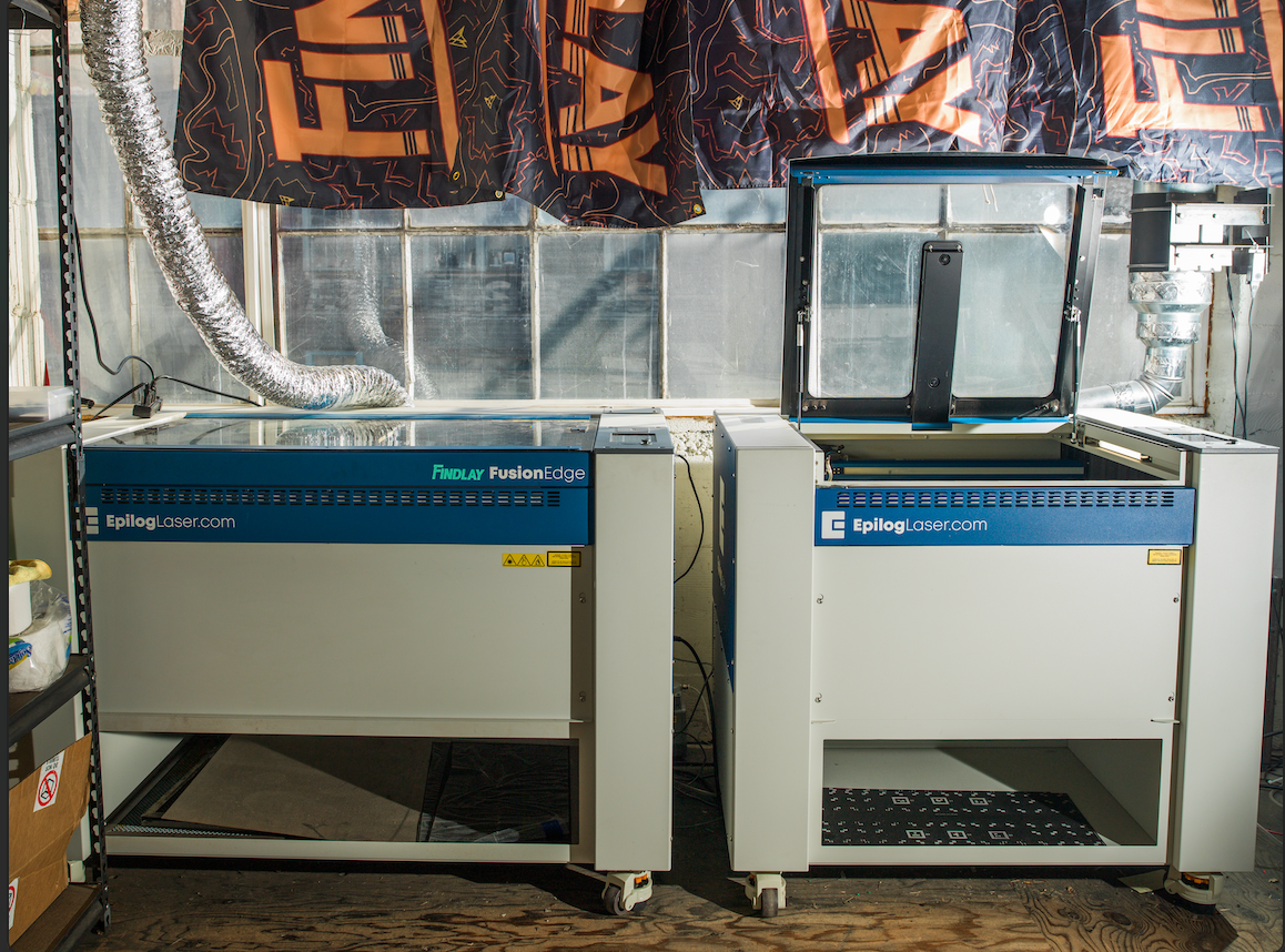 a couple of machines sitting next to each other