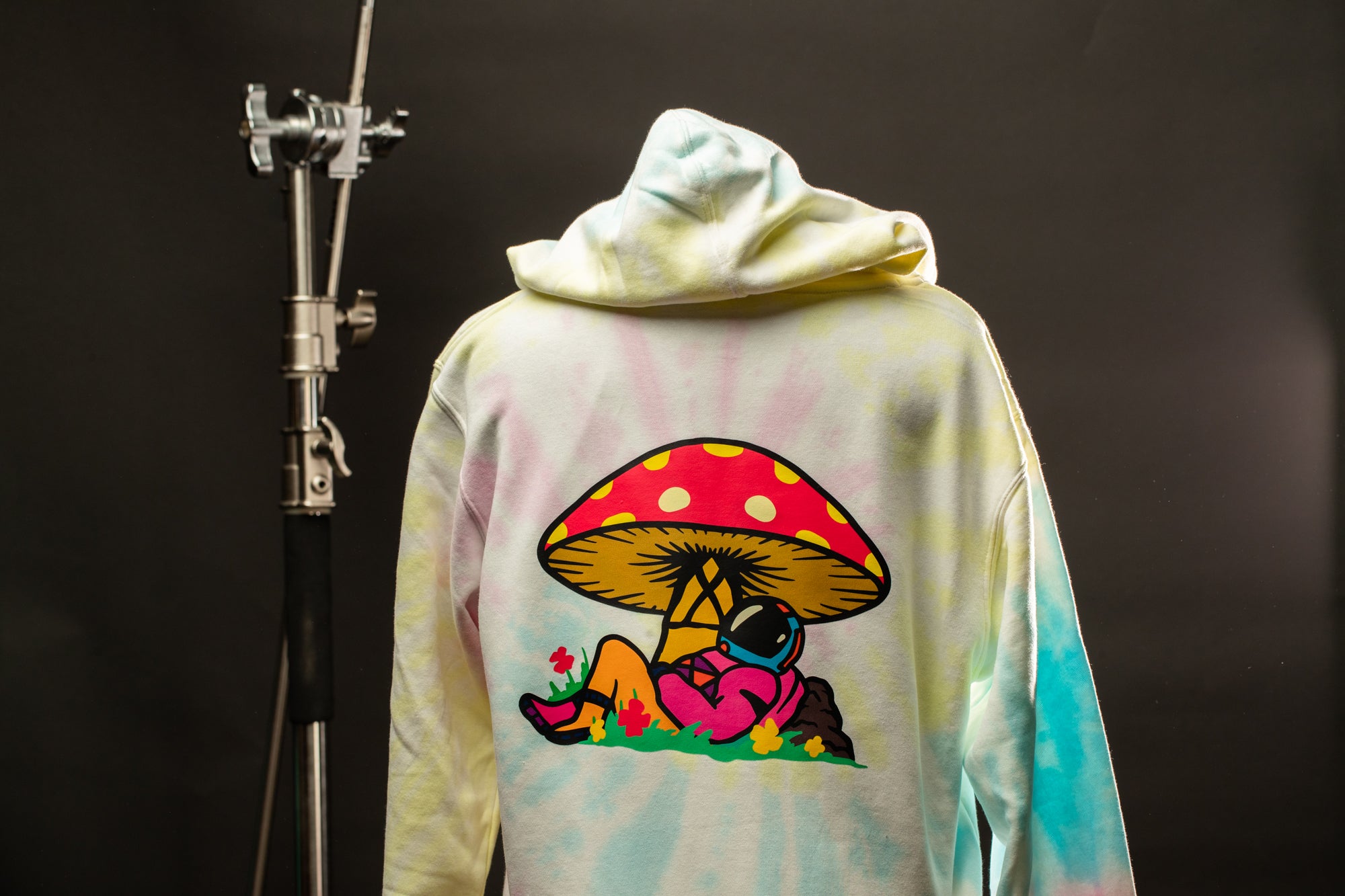 a hoodie with a picture of a mushroom on it