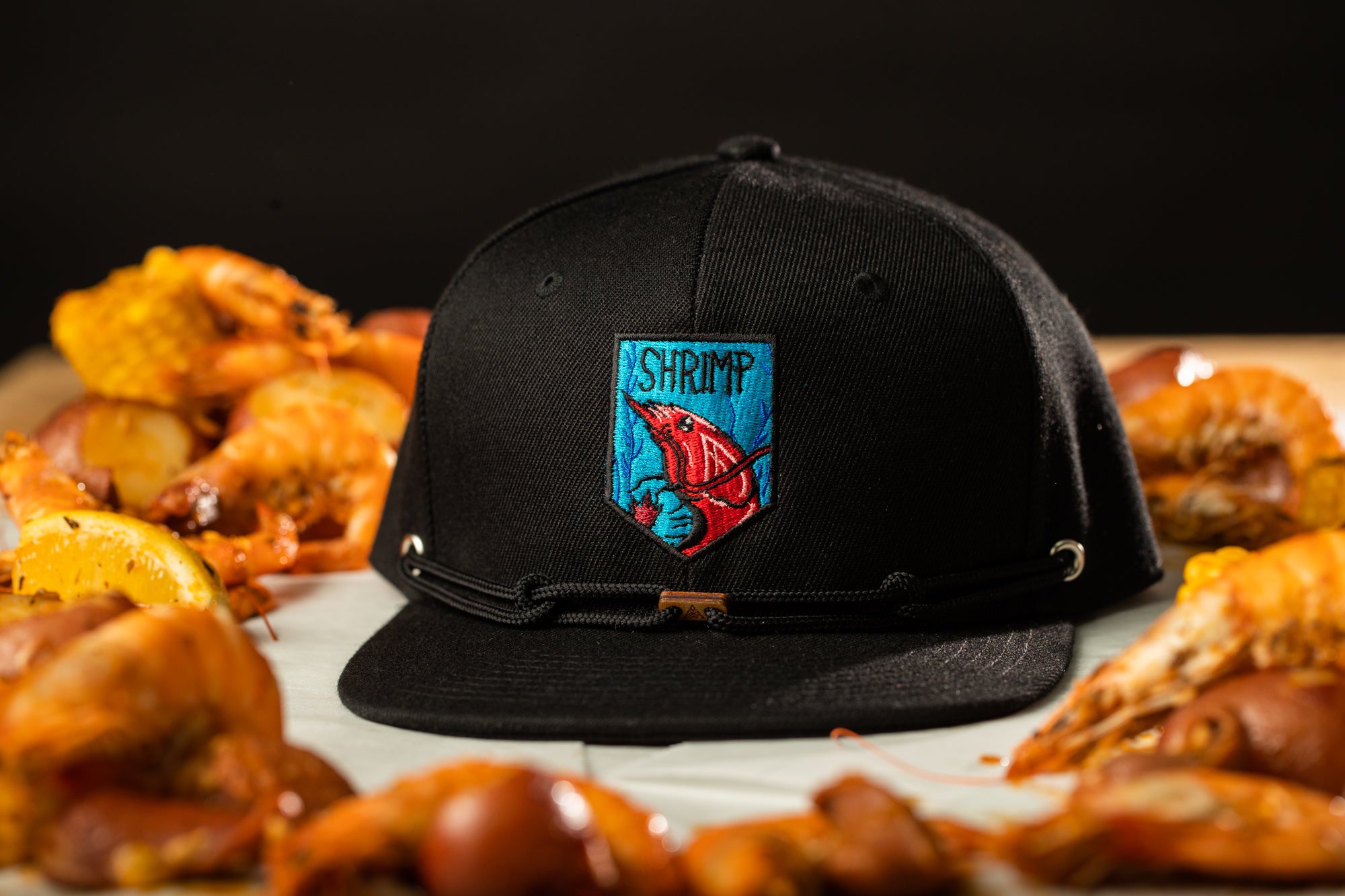 a black hat sitting on top of a table