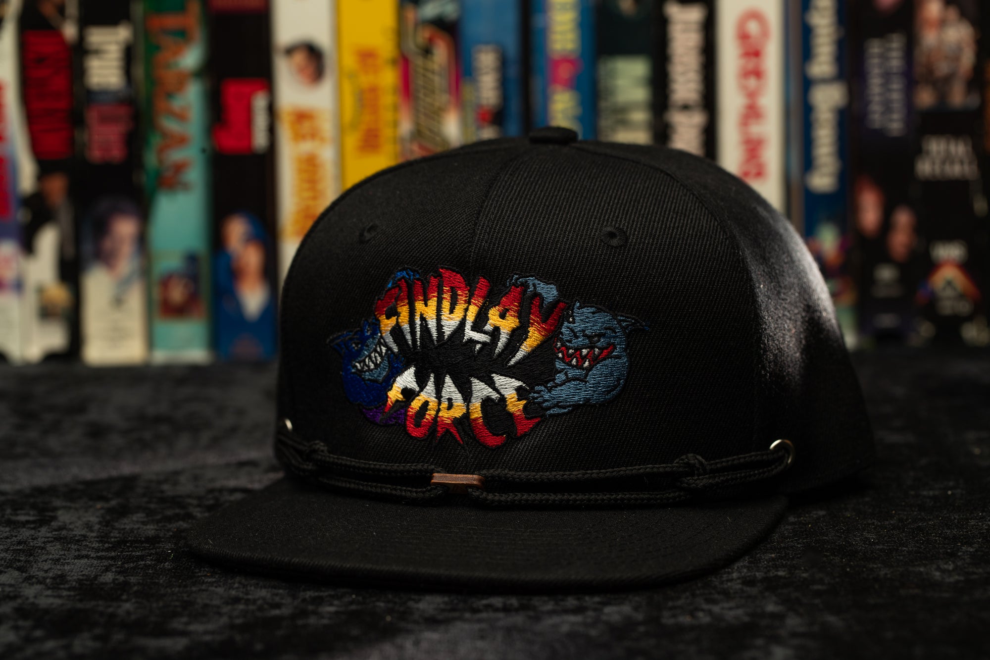 a black hat with a picture of a gorilla face on it