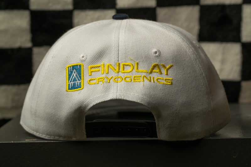 a white baseball cap with the text "FINDLAY CRYOGENICS" embroidered on it.