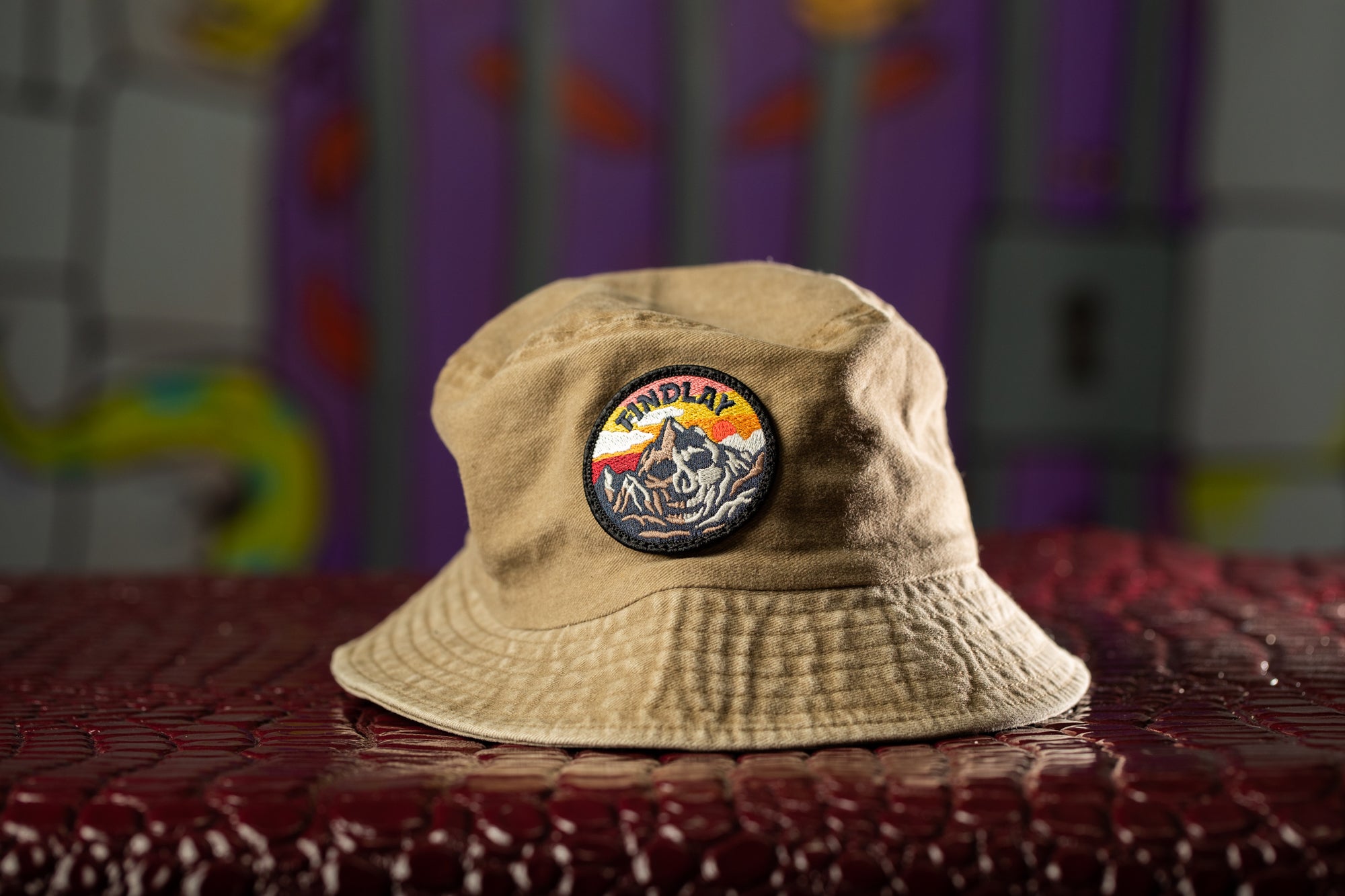 a hat with a sticker on it sitting on a table