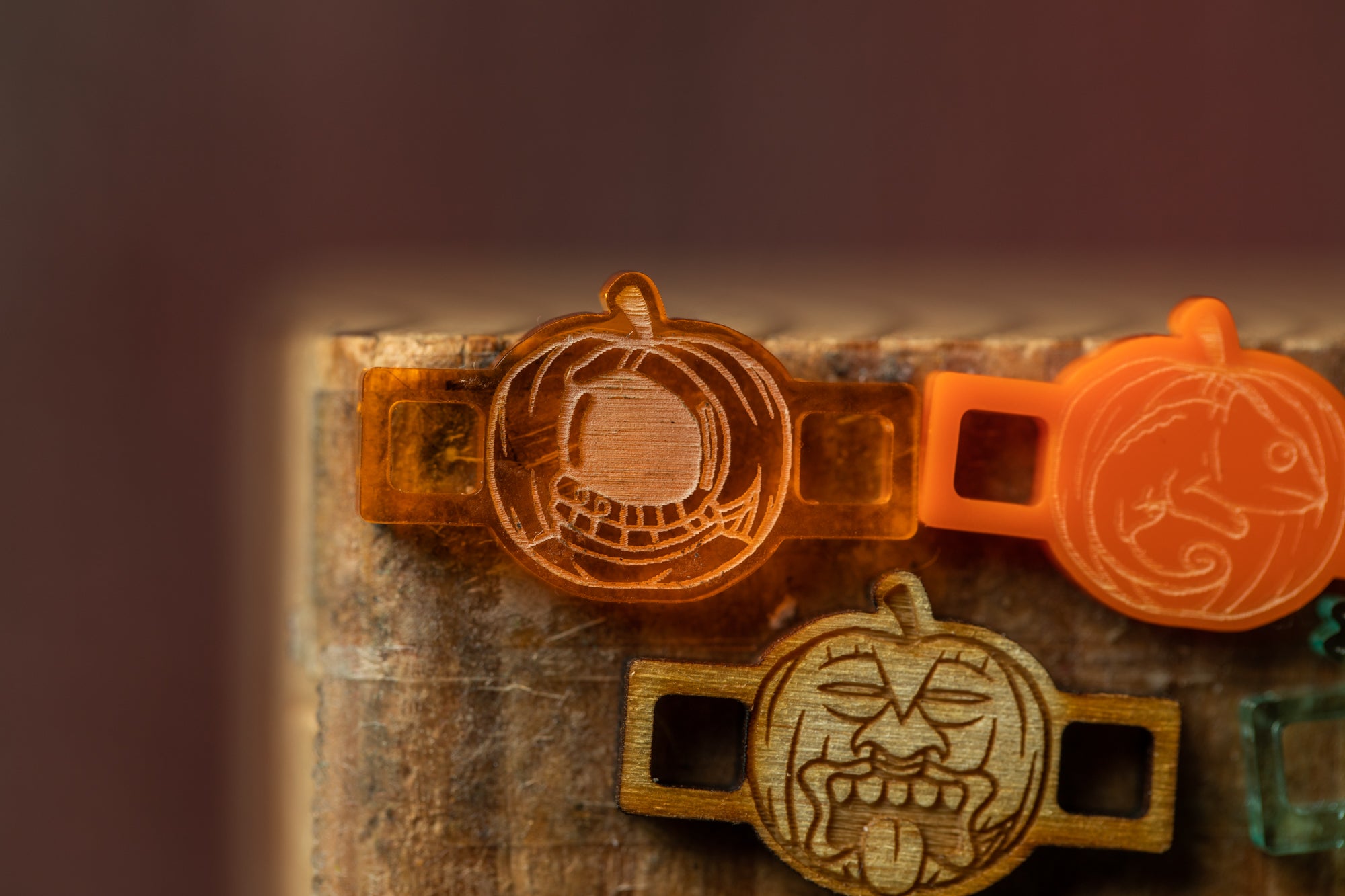 Halloween-themed objects, including carved pumpkins and orange plastic pumpkin-shaped objects.
