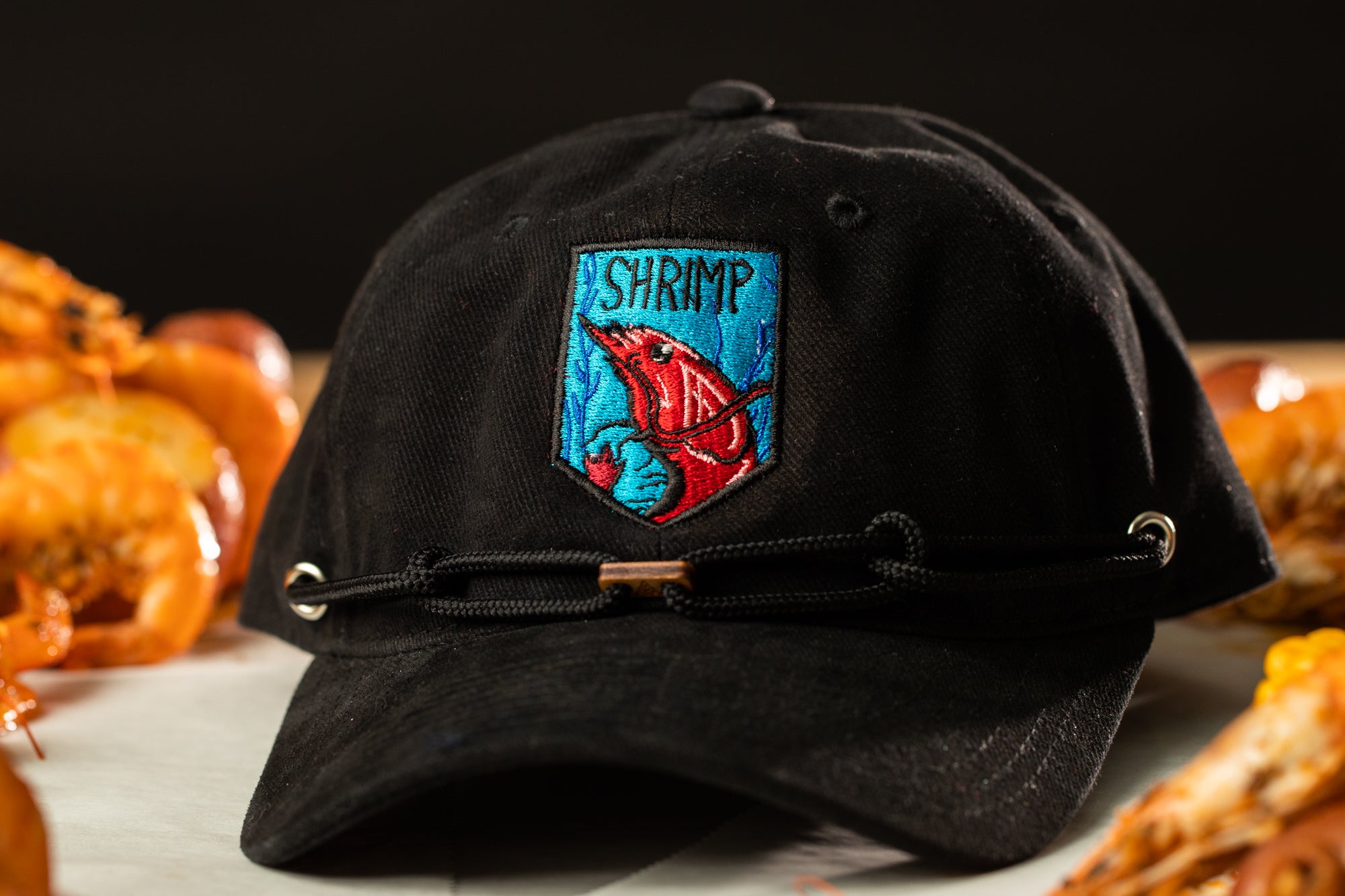 a black hat sitting on top of a table