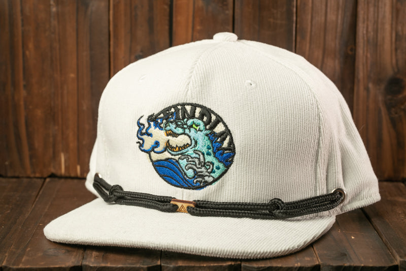 A white baseball cap with a black adjustable strap and a colorful embroidered wave design on the front.