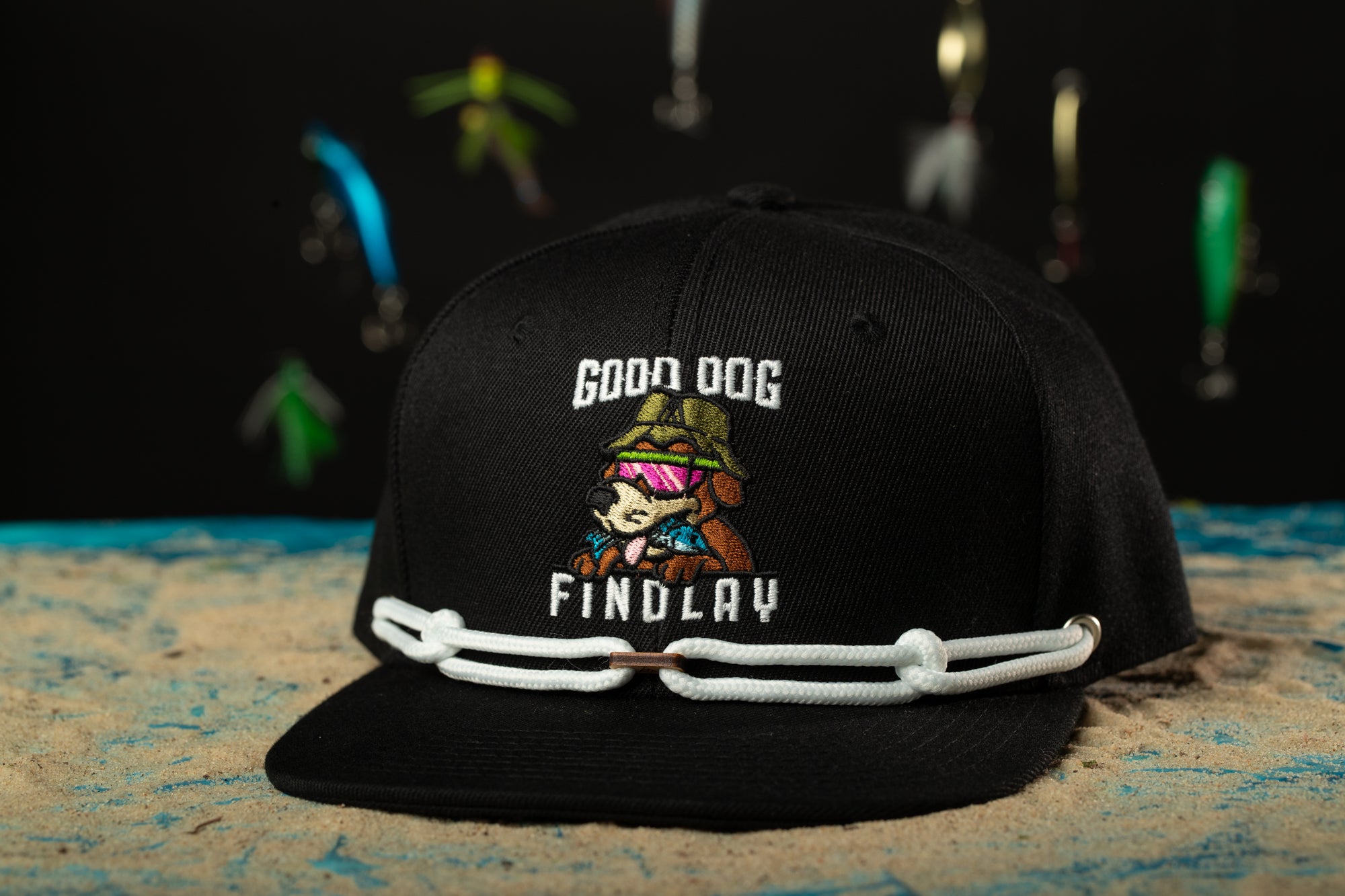 a black hat with a cartoon character on it
