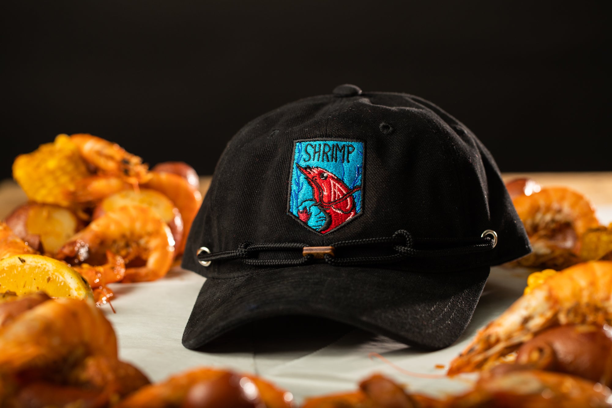 a black hat sitting on top of a table