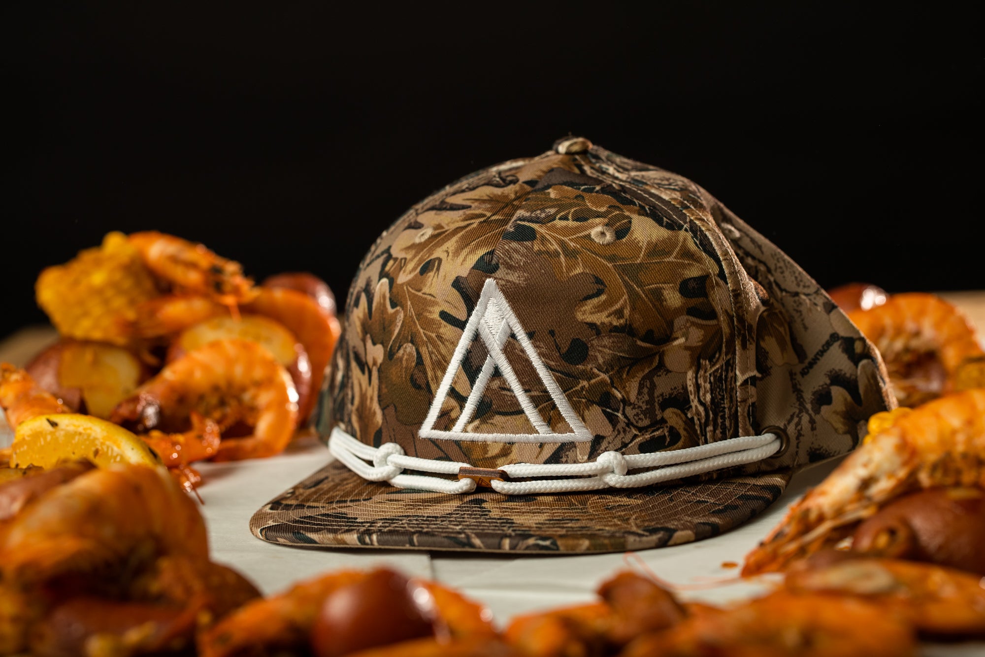 a hat sitting on top of a pile of food