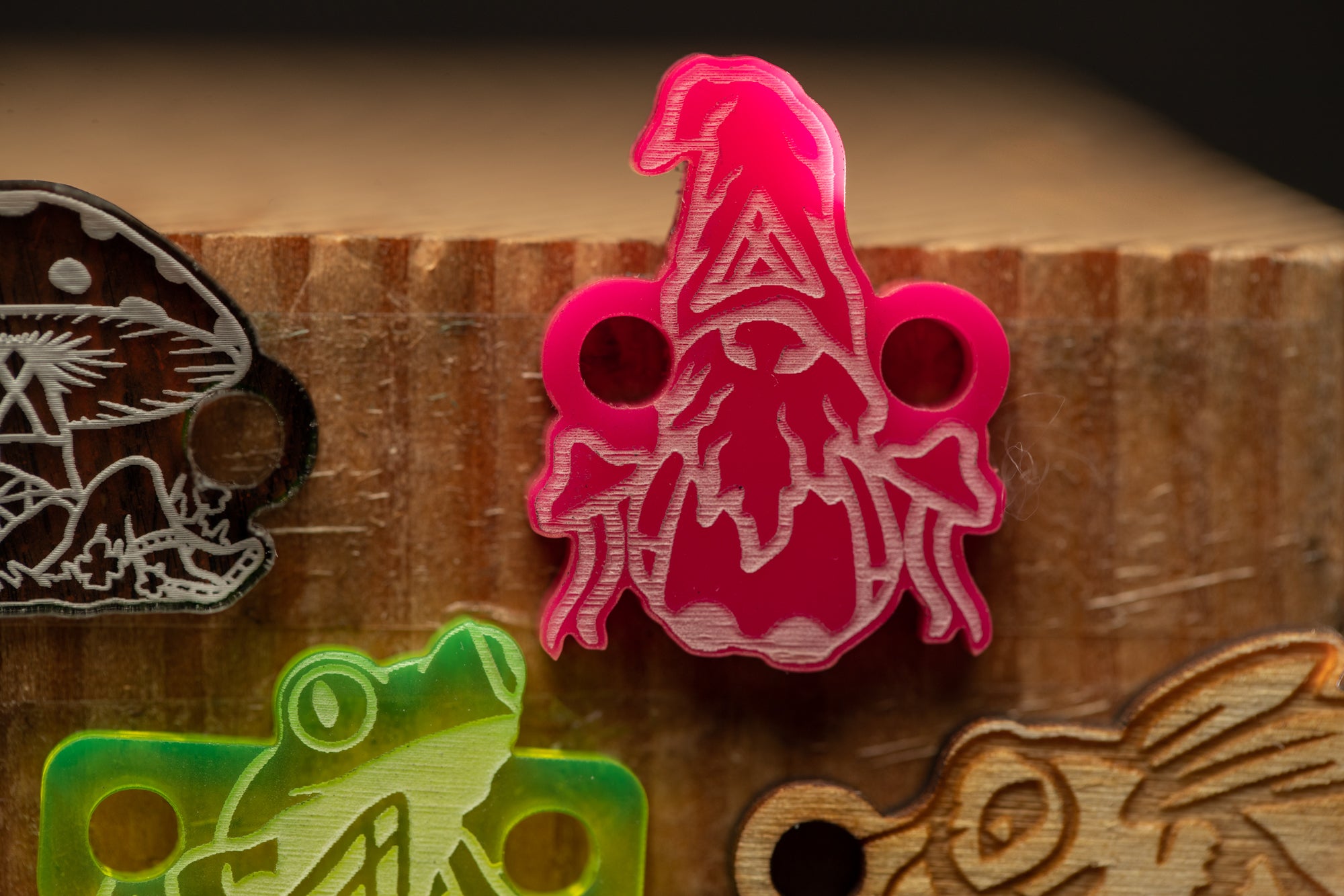 a close up of a bunch of different colored items on a wooden surface