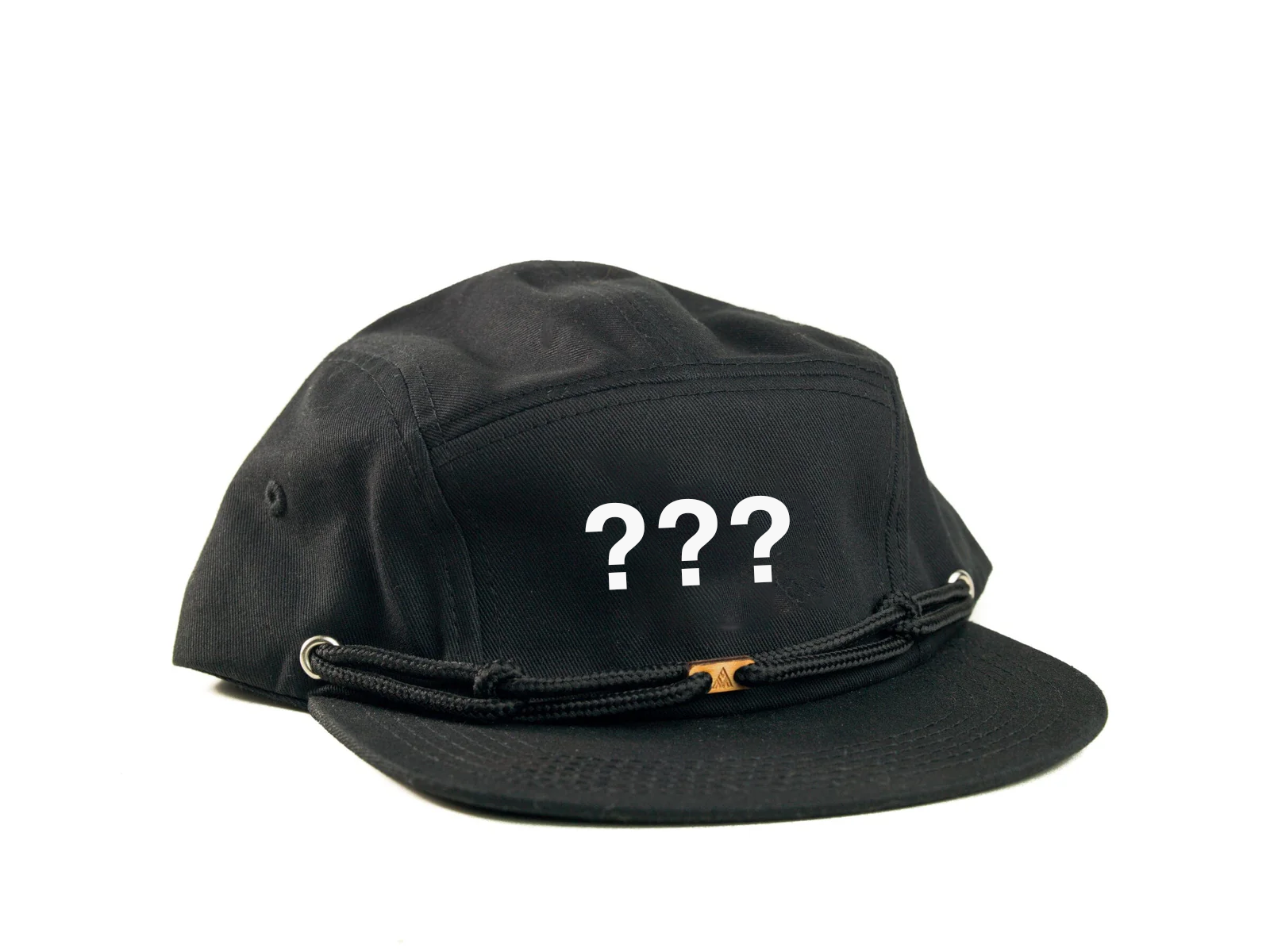 A black baseball cap with a question mark printed on it.