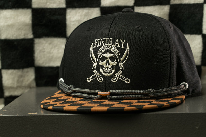 A black baseball cap with a skull and crossbones design, featuring the text "FINDAY" on the front.