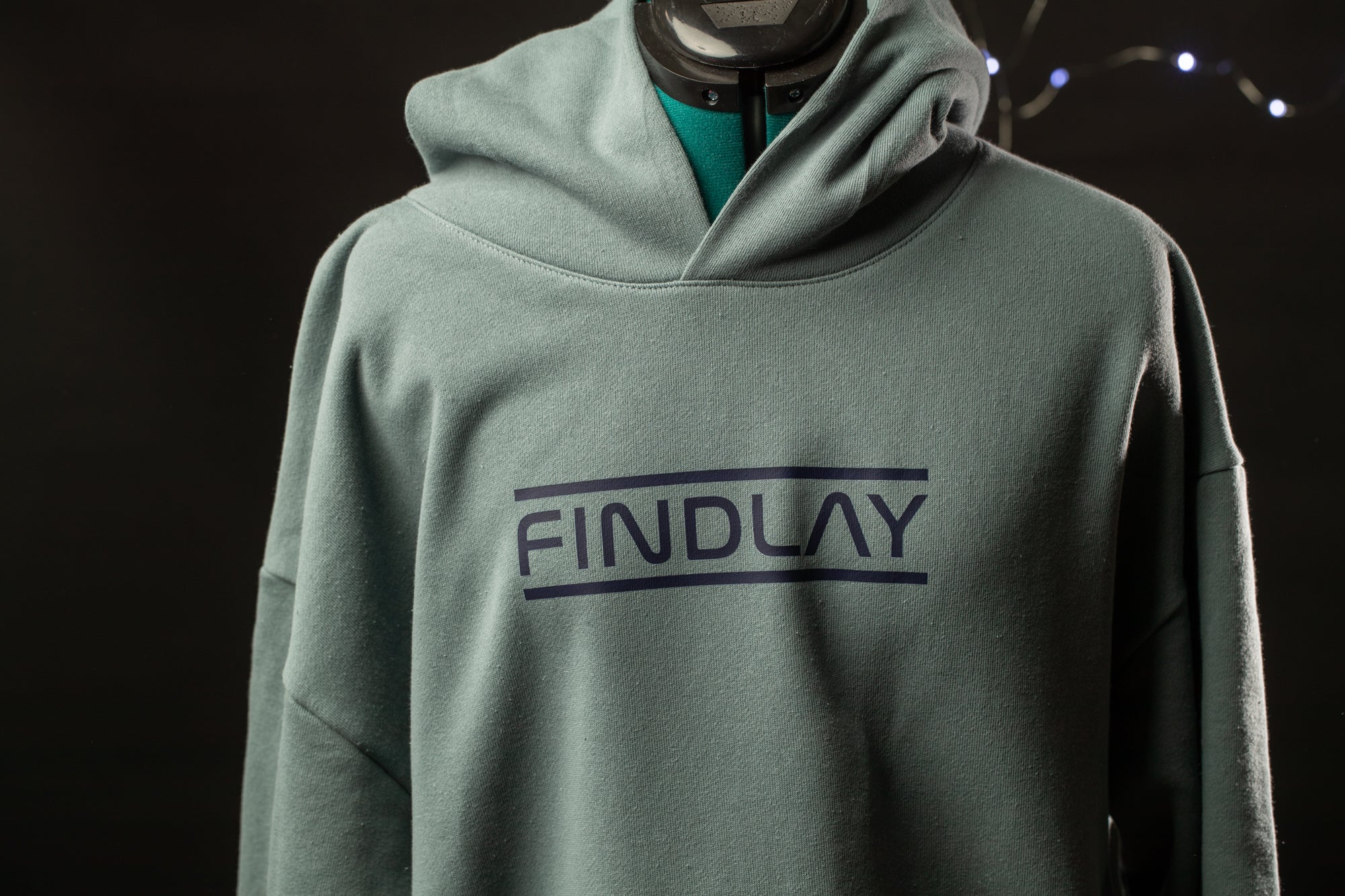 A gray hoodie with the word "FINDlay" printed on it.